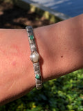 Pearl and Emerald Elite Three Stone Bangle Bracelet