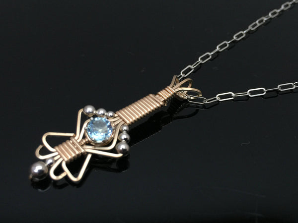 Light Blue Topaz Charm Pendant