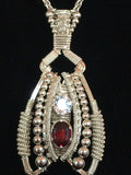 Garnet and Topaz Coiled Amulet
