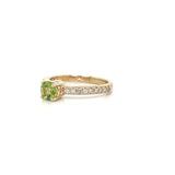 Vibrant Peridot Solitaire Ring with Pavé Diamond Band