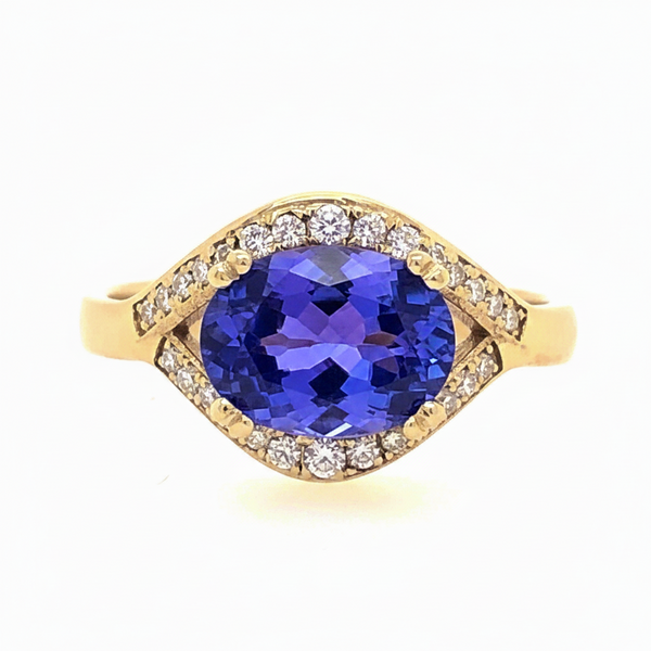 Oval Tanzanite and Diamond Halo East to West Setting