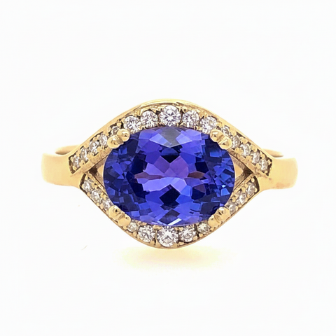 Oval Tanzanite and Diamond Halo East to West Setting