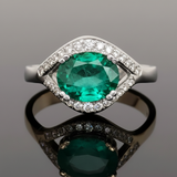 Emerald and Diamond Halo East to West Setting