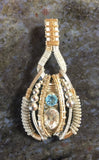 White Topaz and Swiss Blue Topaz Coiled Amulet