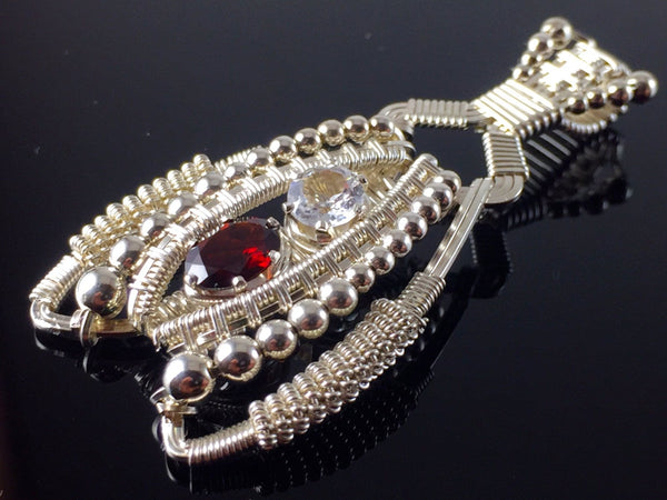 Garnet and Topaz Coiled Amulet